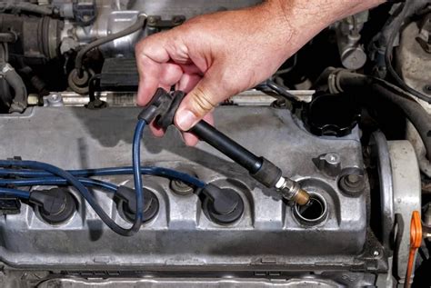 electrical boxes over the spark plugs|spark plugs how they work.